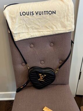 Louis vuitton new wave purse heart shapped